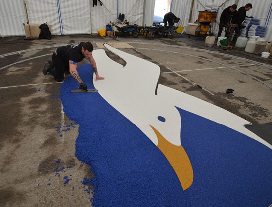 Clearstone installing resin bound Albion Seagull logo - Amex Community Stadium Brighton