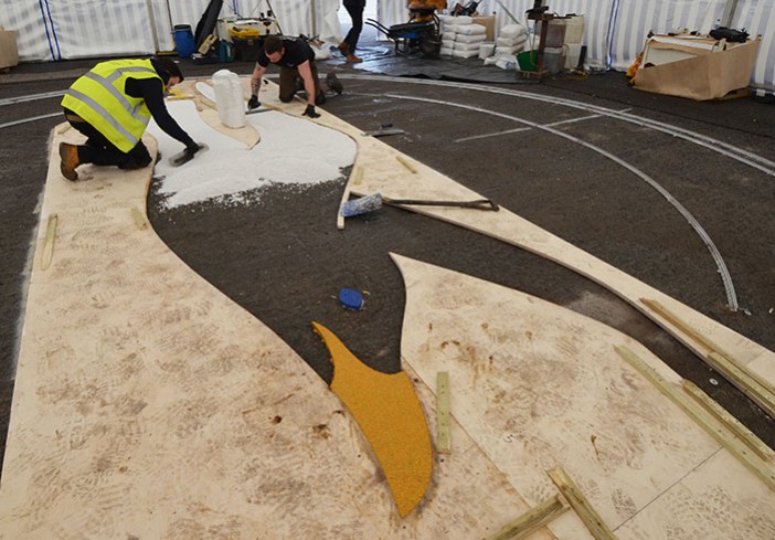 Clearstone installing resin bound Albion Seagull logo - Amex Community Stadium Brighton