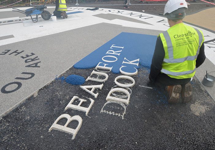 Resin bound colour way-finding dock side graphic, Parc Tawe retail park Swansea