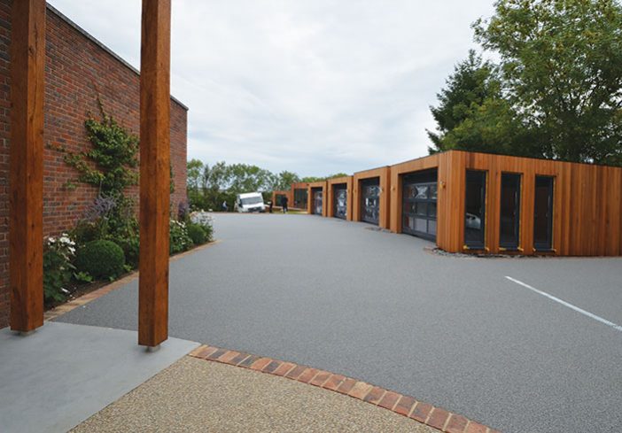 Resin bound drive for luxury garages A Room in My Garden Cuckfield, Sussex