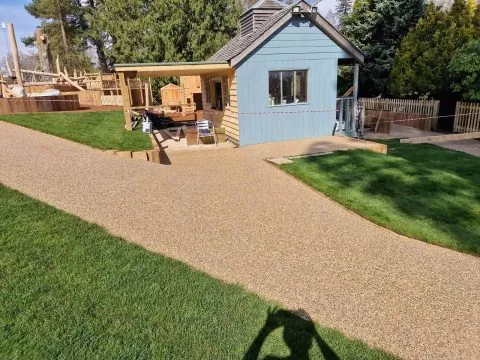 Resin bound paving used across multiple applications - driveway, patio and path
