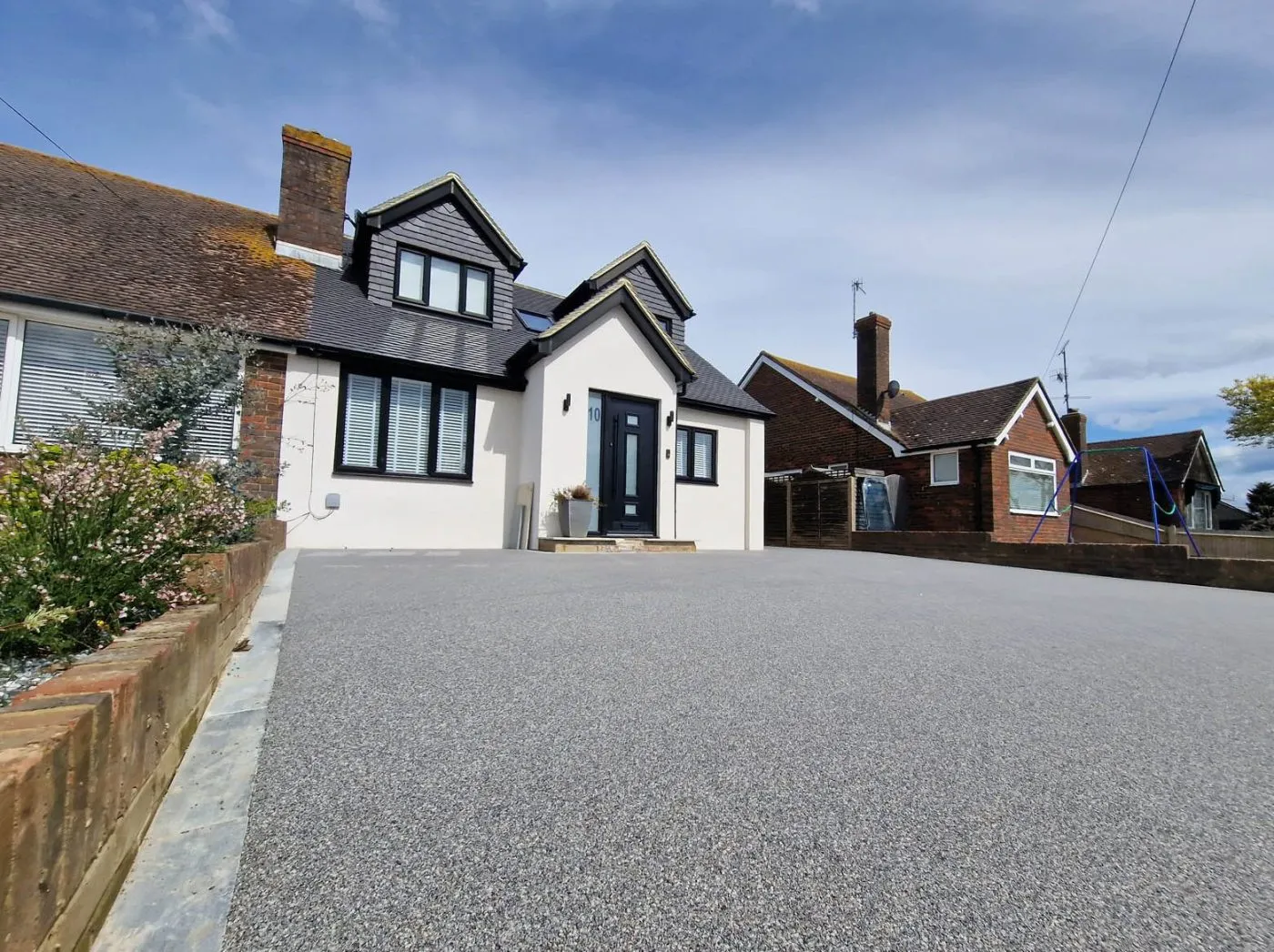 Resin bound driveway at a residential property - front of house context