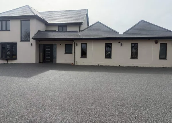 Resin bound driveway natural two-storey home